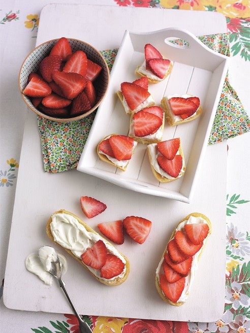 Strawberries and cheese on toast