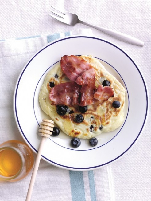 Blueberry feta hotcakes with bacon and honey