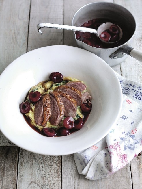 Crispy skinned duck breast with a cherry sauce